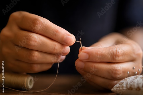 The moment of delicate hand-stitching