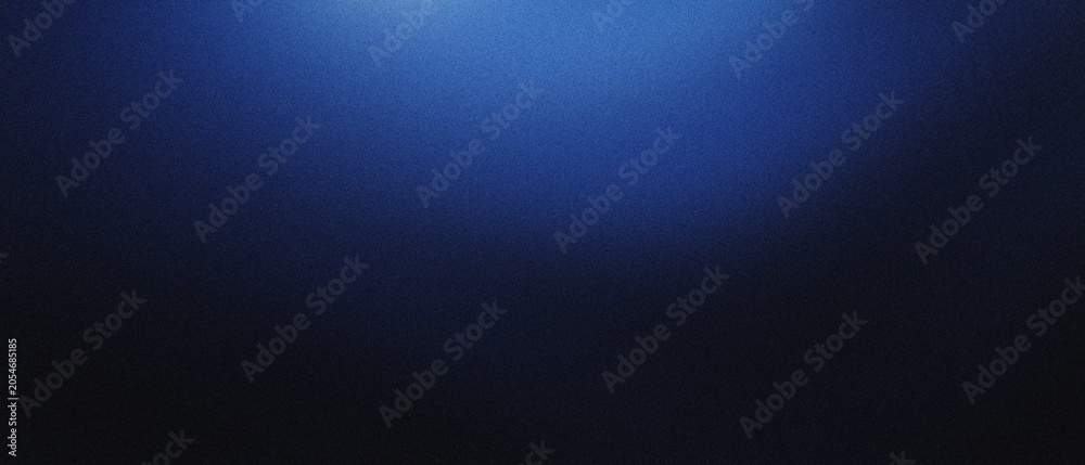 Obraz premium Deep blue textured background with subtle gradient and bright top light for abstract design elements