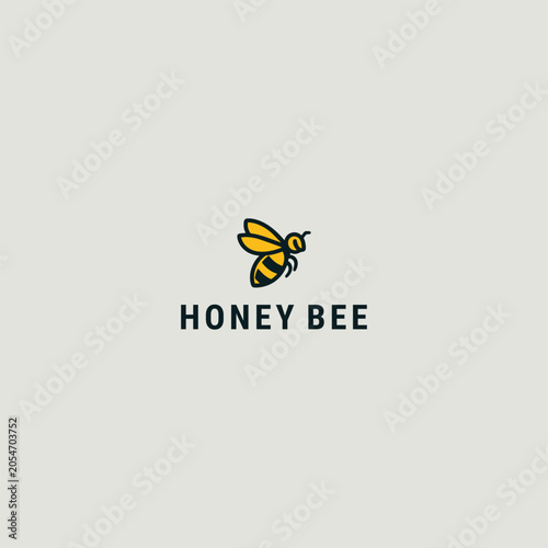 Minimalist honey bee logo design with bold text on light background