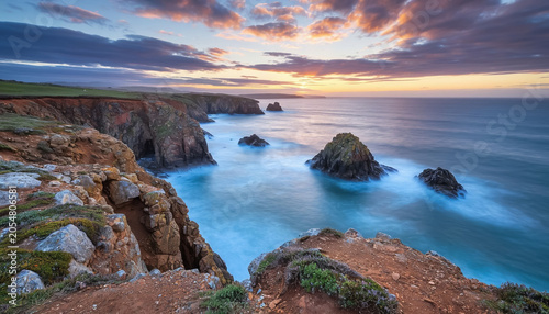 Gentle Sunset over Secluded Cove, Tranquil Evening Seascape for Travel, Relaxation or Coastal Wallpaper Concept