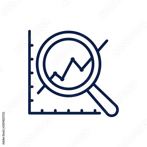 Magnifying glass over a financial graph showing upward trend.