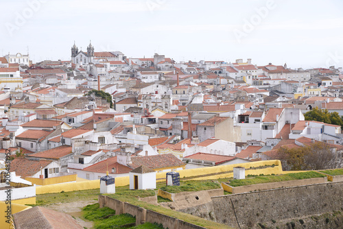 Photos Panoramic high-angle view of the historic white houses and terracotta roofs in the garrison border town of Elvas, looking over the medieval fortification walls and bastions, Alentejo region, Portugal