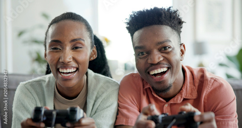 Fotografía Relax, laugh and black couple with video game on sofa for fun challenge, esport date or bonding