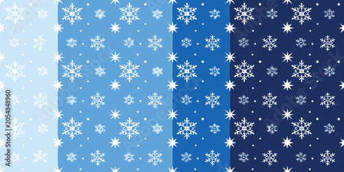 Winter Christmas seamless pattern set with white snowflakes and stars on blue background for holiday wrapping paper and textile.
