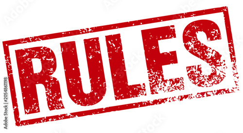 Foto Red rubber stamp imprint with the word RULES clearly visible, conveying a sense