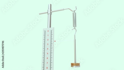 Foto A Hooke's Law apparatus is a standard laboratory setup used to demonstrate how t