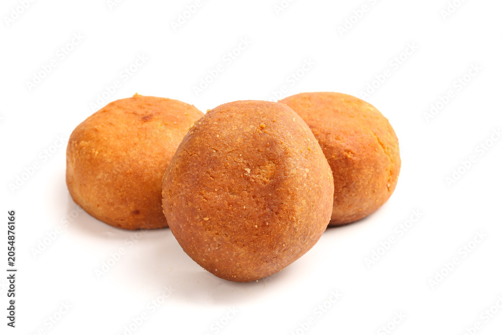 Fototapeta premium Golden Fried Pastry Balls - Traditional Handmade Crispy Snack