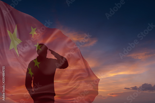 Quadro em tela Silhouette of military mans and National flag of China