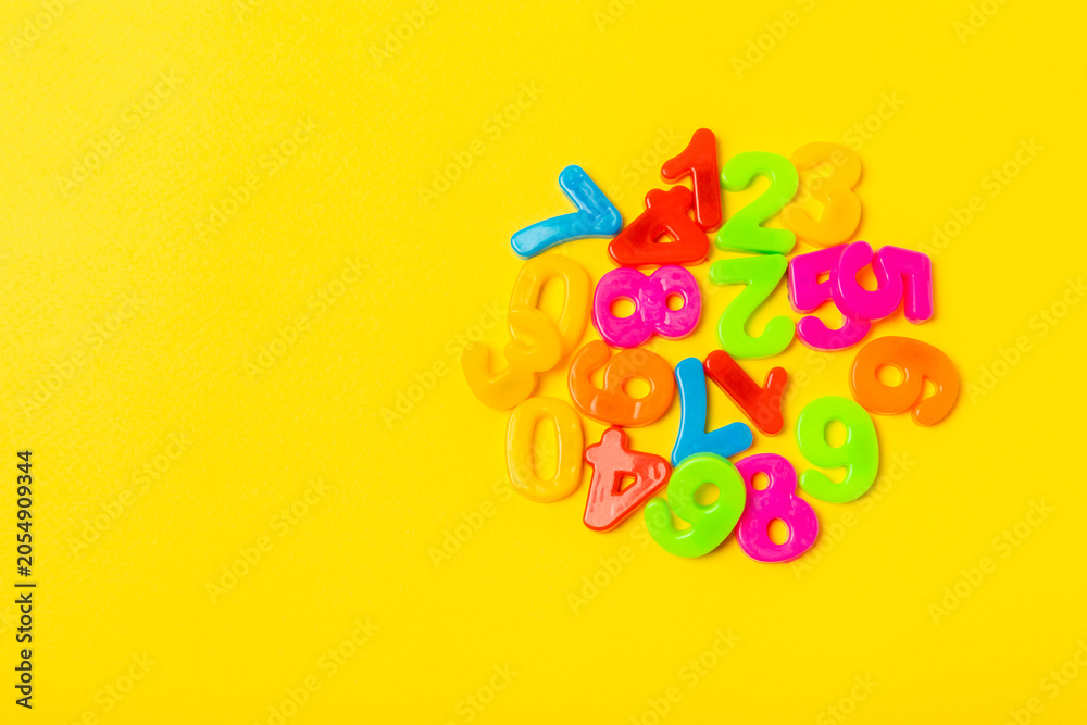 Fototapeta premium Background of numbers. Number wood block cubes for learning Mathematic, education math concept. childhood education. numbers kids. Numbers texture. Finance data concept. pattern with numbers. financia