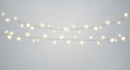 Warm glowing string lights decoration for festive occasions and celebrations on a neutral background