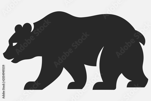 Foto Silhouette of a Bear: A bold, black silhouette of a bear walking.