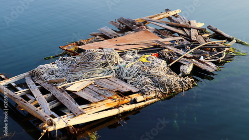 Tableau sur toile Floating Ocean Pollution: Marine Debris and Abandoned Fishing Gear Creating Ecol