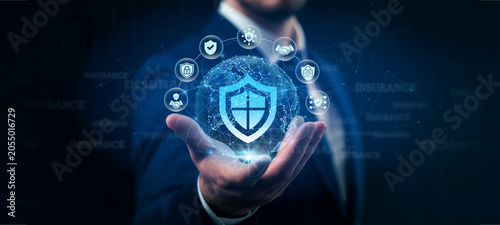Принти на полотні Insurance Underwriter hands holding application form Insurance risk assessment policy pricing claims network connections regulatory compliance solvency reserving premium