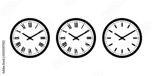 Fotografie Clock Faces Set of Three Round Analog Clocks with Black Roman Numerals and Minim