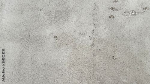 the texture of the concrete wall