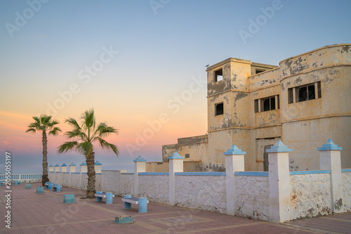 Abandoned Spanish Colonial Building along the Atlantic Promenade at Sunset in Sidi Ifni - Morocco