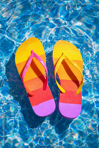 Colorful sleepers floating on pool water summer vacation generated.AI