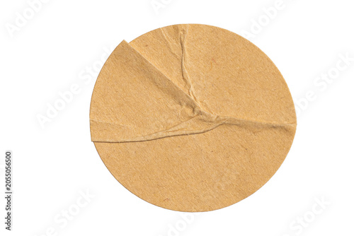 Photos A torn piece of brown paper on a transparent background