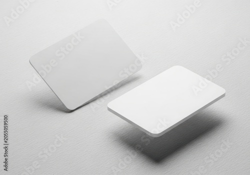 Blank white business cards on a clean surface