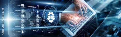 Tableau sur toile Business strategist using a laptop to analyze B2B business market trends
