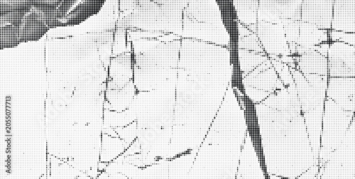 A close-up photo of a cracked and dirty glass surface with scratches