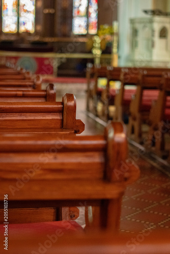 Foto Title:
Wooden Church Pew in Historic Christian Church Interior with Stained Glas