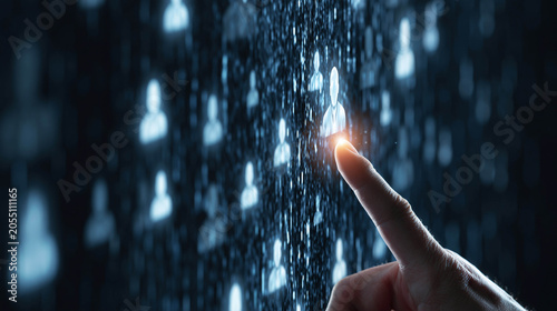 A hand clicks on a virtual user icon in a digital hologram — the concept of staffing, recruitment, candidate selection, and digital interaction in HR and IT.