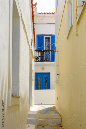Narrow street of the town of Chora. Andros Island, Cyclades, Greece