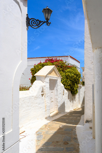 Narrow street of the town of Chora. Andros Island, Cyclades, Greece