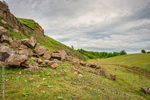 Fallen stones at Greenleighton Quarry, a disused Limestone Quarry now a Nature Reserve and is a Protected Area and SSSI in Northumberland, England, near Rothley