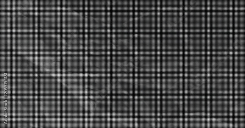 Foto A close-up view of crumpled paper texture in dark gray tones