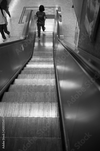 people on escalator