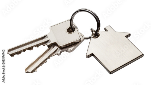 Isolated two shiny silver house keys with keyring and decorative house-shaped pendant symbol
