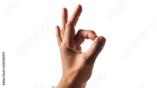 Fotografie Isolated human hand showing the OK sign or gesture, expressing approval and success