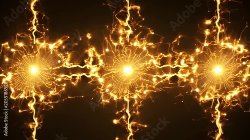 Bright golden energy bursts with electric arcs connecting three glowing spheres against a dark background, showcasing dynamic light patterns and vibrant visual effects