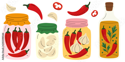 Fotografie Set of homemade preserves in glass jars, pickled red hot chili peppers, garlic,