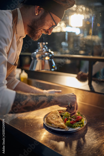 Photography Cook in Professional Modern  kitchen, restaurant concept
