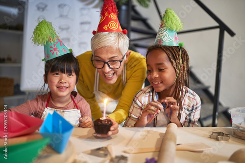 happy kid having Birthday suprise on a creative workshop  Creative, hobby ,workshop  concept