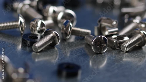 Metal screws for fastening equipment. Soft focus. Close-up. 