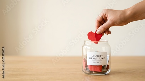 Heart Donation in Glass Jar Charity Concept
