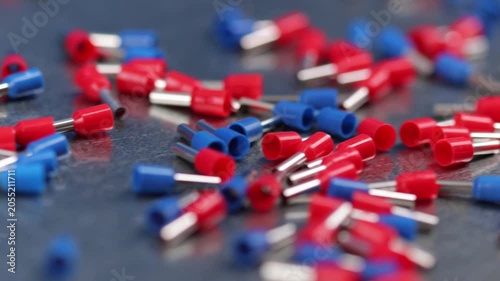 Metal tips with a plastic base for copper electrical wires. 