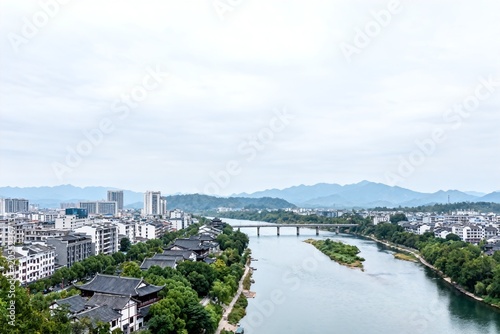 River Cityscape with Traditional and Modern Buildings