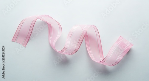 Breast cancer awareness pink ribbon symbol for support and research