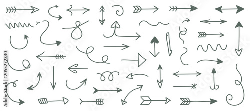 Slika na platnu Hand drawn arrow and flourish set black line illustration