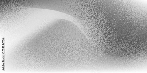 Silver foil metallic texture with glossy gray steel surface. Frosted glass blur effect, soft glare reflections, bright polished metal look. Aluminum or chrome glistening for luxury, tech, design