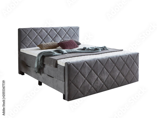Classic double bed with big headboard isolated on white