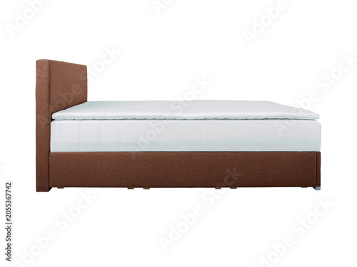 Classic double bed with big headboard isolated on white