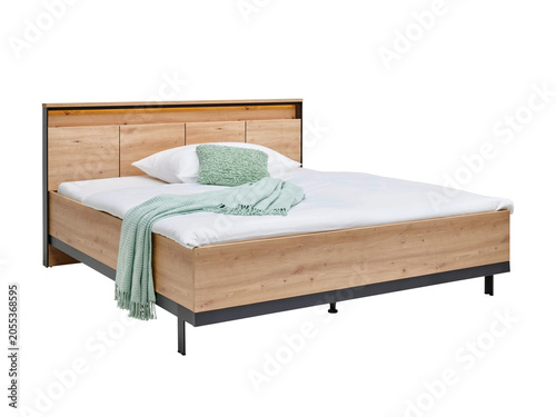Classic double bed with big headboard isolated on white