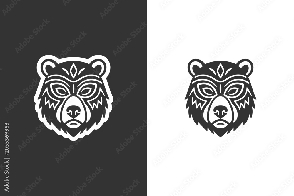Obraz premium Two stylized bear head illustrations with tribal patterns on black and white backgrounds
