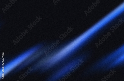 Foto Blue light streak on dark background